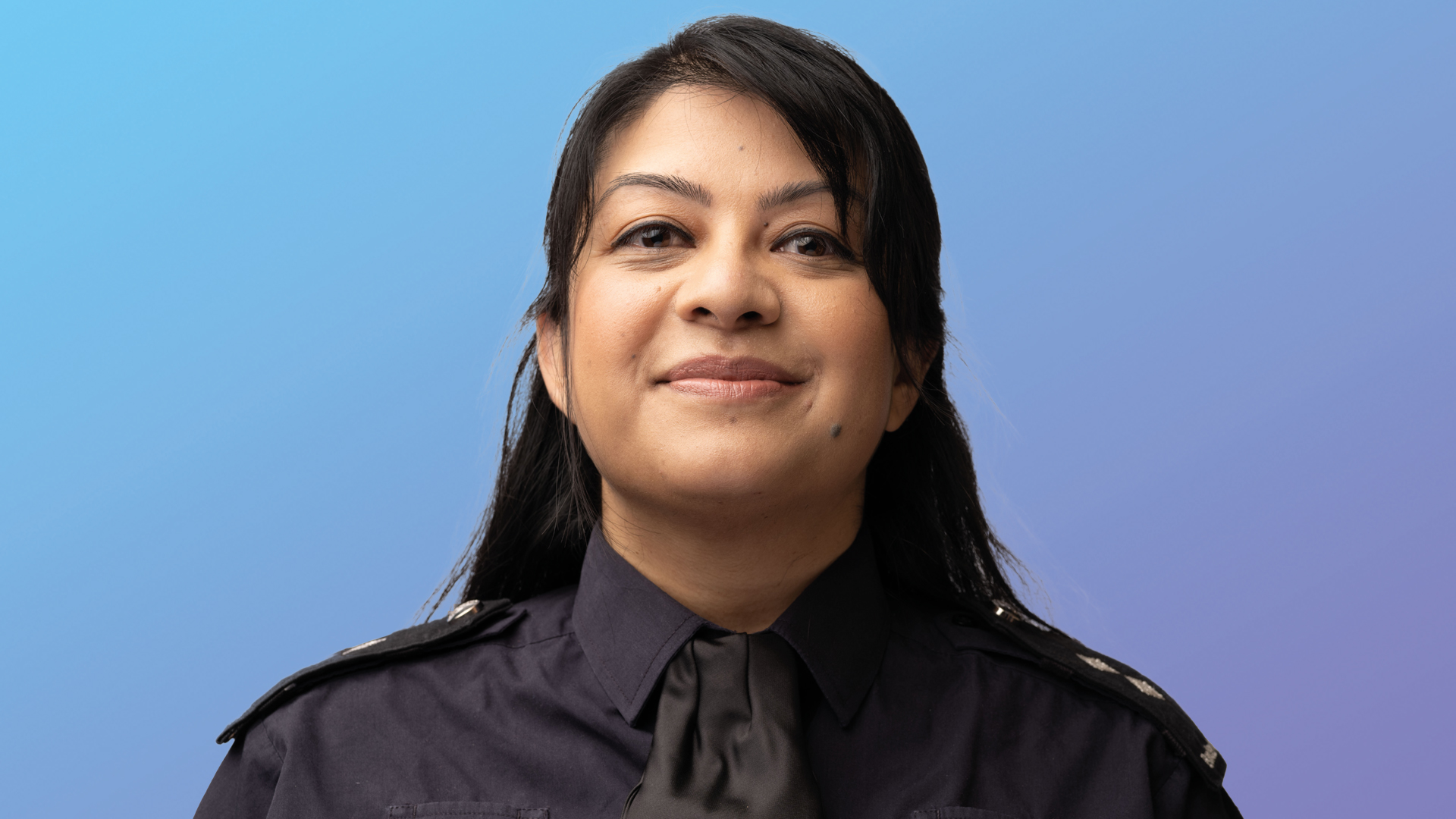 Border Force Officer on a blue gradient background