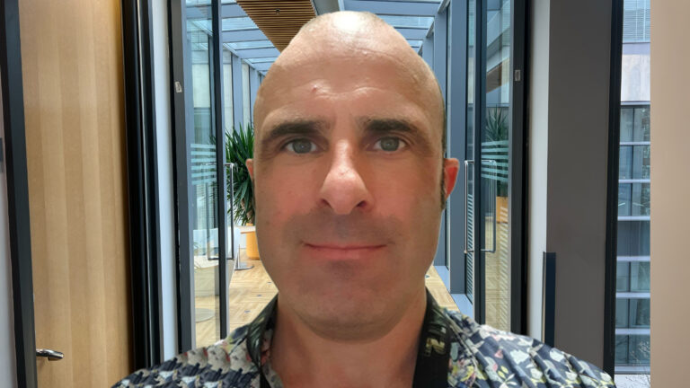 Photo of Andrew, a Product Manager at the Home Office.  