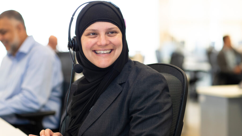 member of staff with headset on